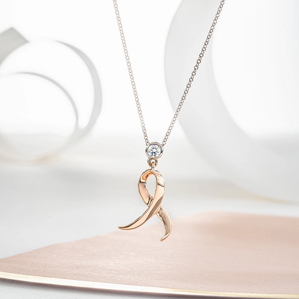 Shining Strength Diamond Pendant 14 karat rose and white gold  .11ct diamond  18" white gold chain