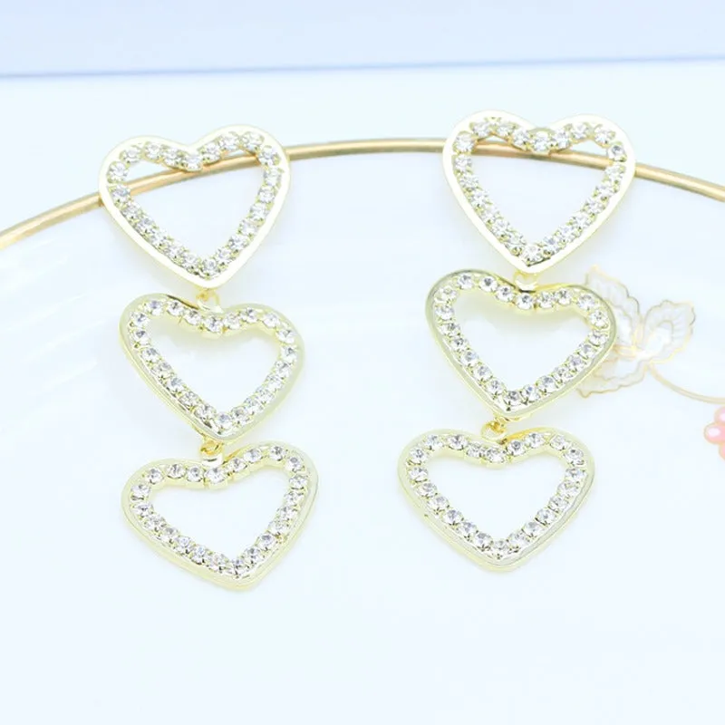 Wholesale 925 Silver Needle Sweet Hollow Diamond Love Earrings