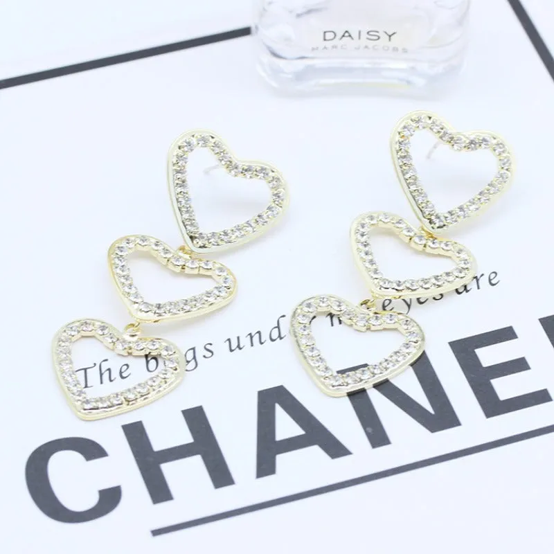 Wholesale 925 Silver Needle Sweet Hollow Diamond Love Earrings