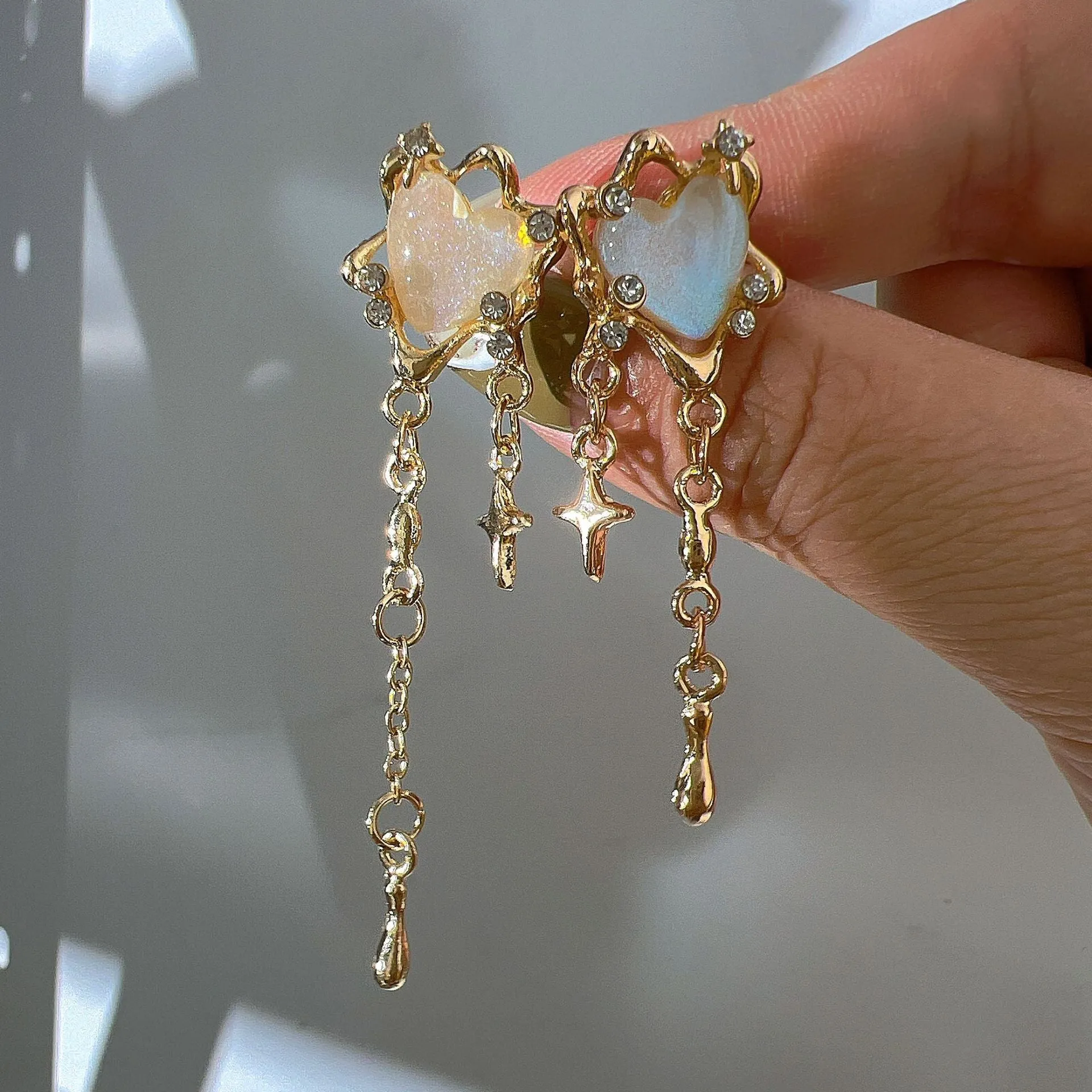 Wholesale Alloy Heart Four Pointed Star Tassel Earrings
