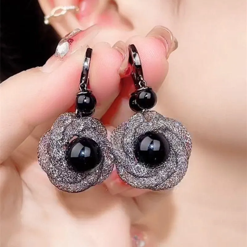 Wholesale beauty black flower  cold wind New earrings
