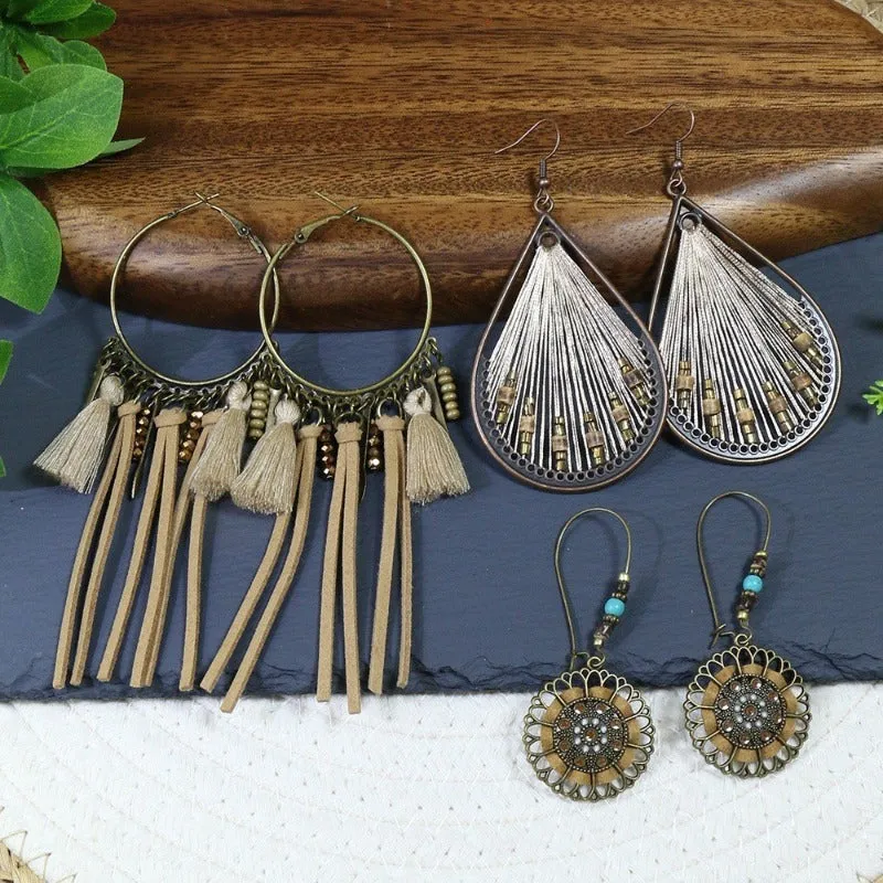 Wholesale Bohemian Rice Pearl Shell Long Tassel Earrings