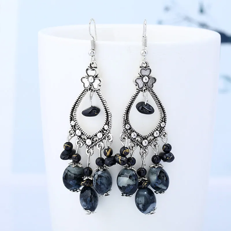 Wholesale Bohemian tassel vintage long carved earrings