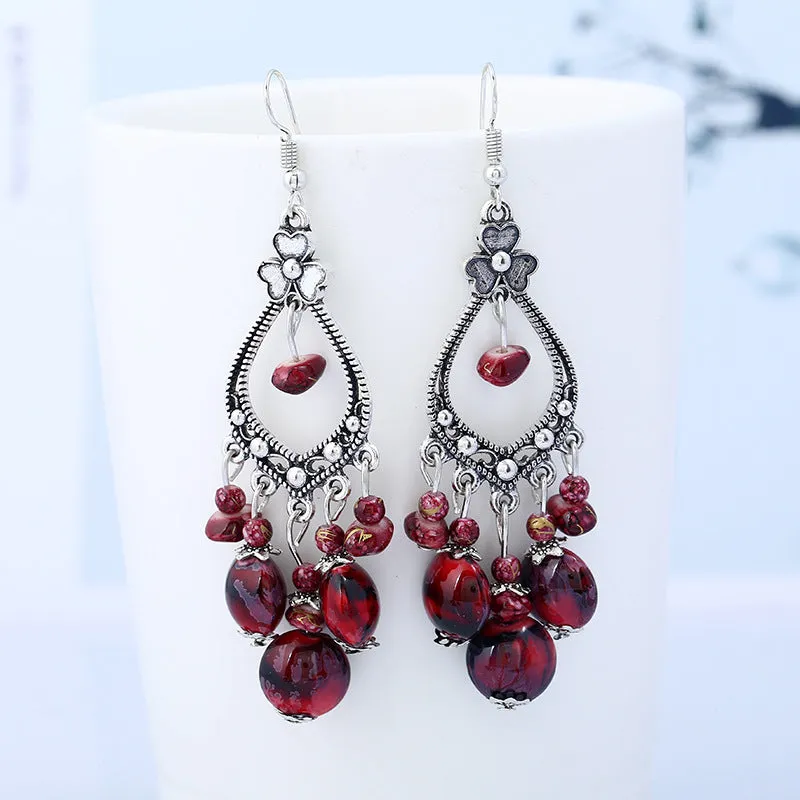 Wholesale Bohemian tassel vintage long carved earrings