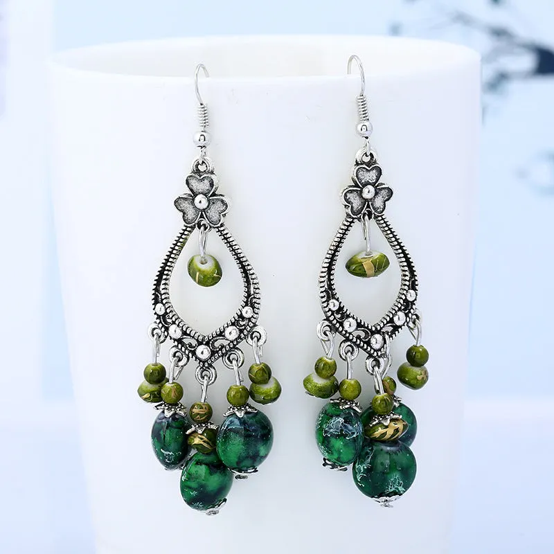 Wholesale Bohemian tassel vintage long carved earrings