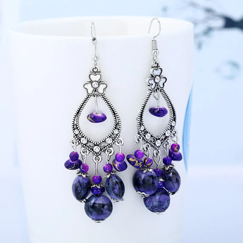 Wholesale Bohemian tassel vintage long carved earrings