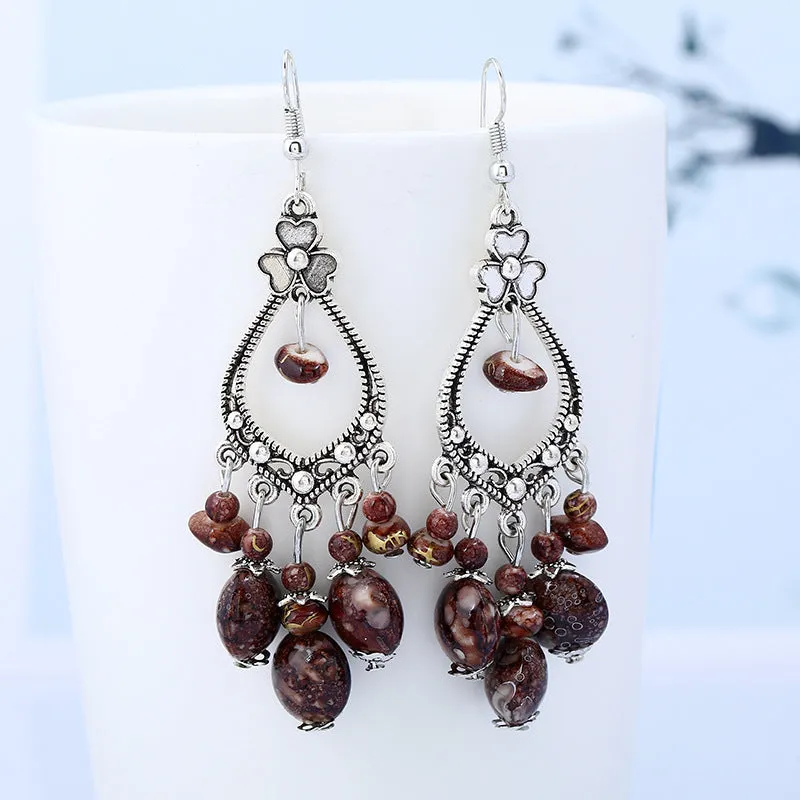 Wholesale Bohemian tassel vintage long carved earrings