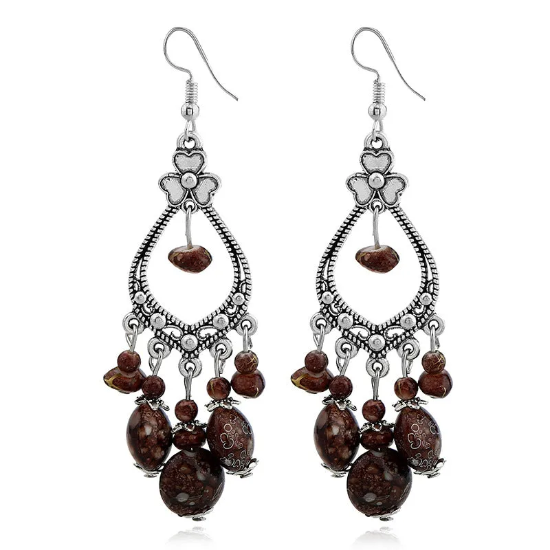 Wholesale Bohemian tassel vintage long carved earrings