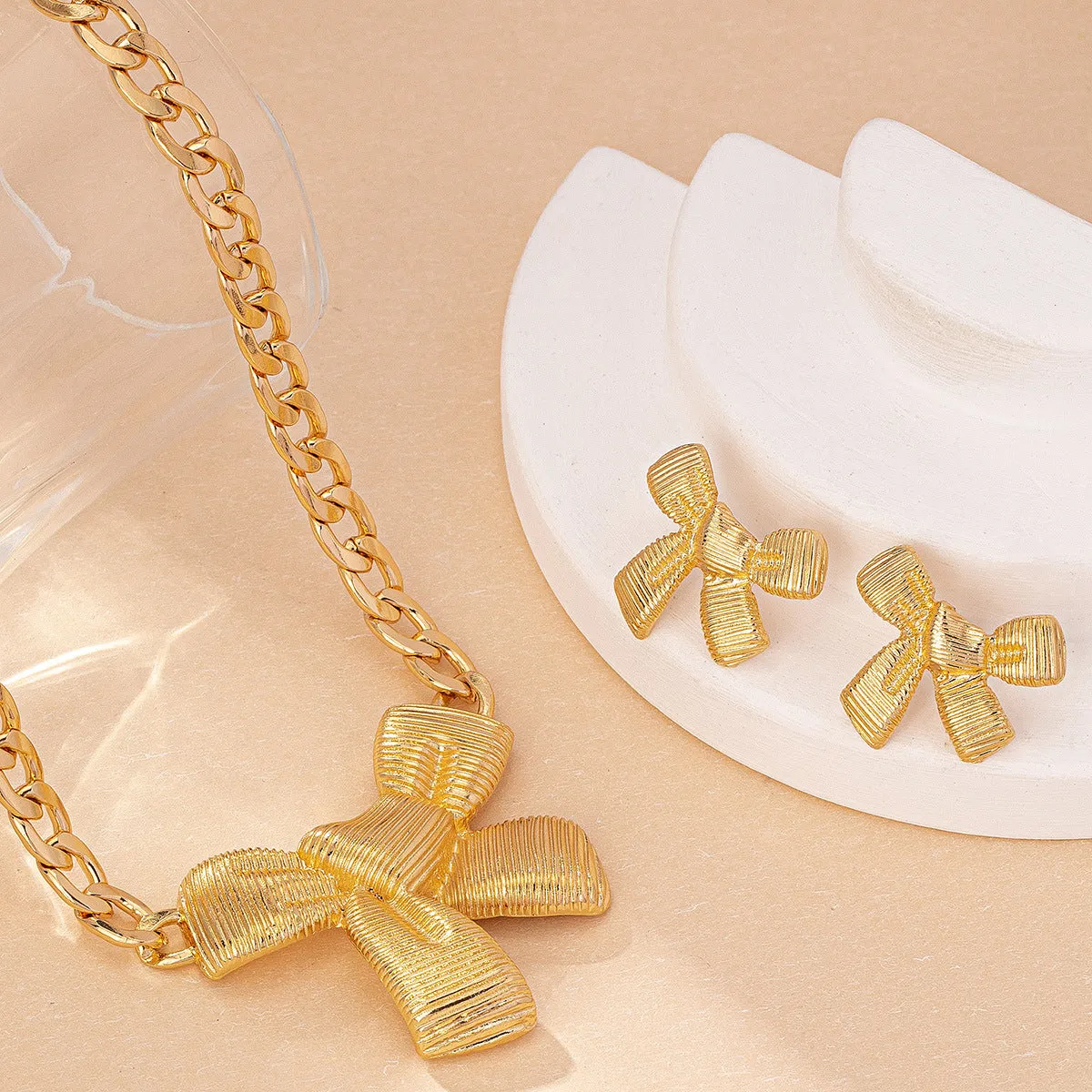 Wholesale Bow Pendant Necklace and Bow Stud Earrings Jewelry Set