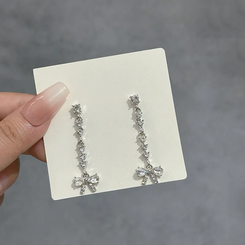 Wholesale Bow Studded Diamond Long Tassel Alloy Earrings