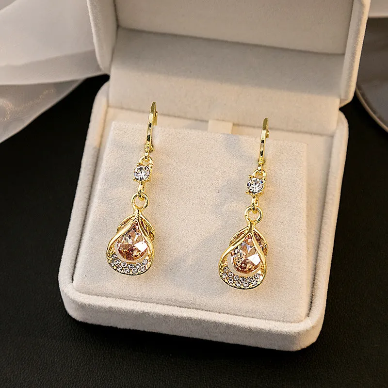 Wholesale Cat's Eye Stone Diamond Droplet Hollow Alloy Earrings