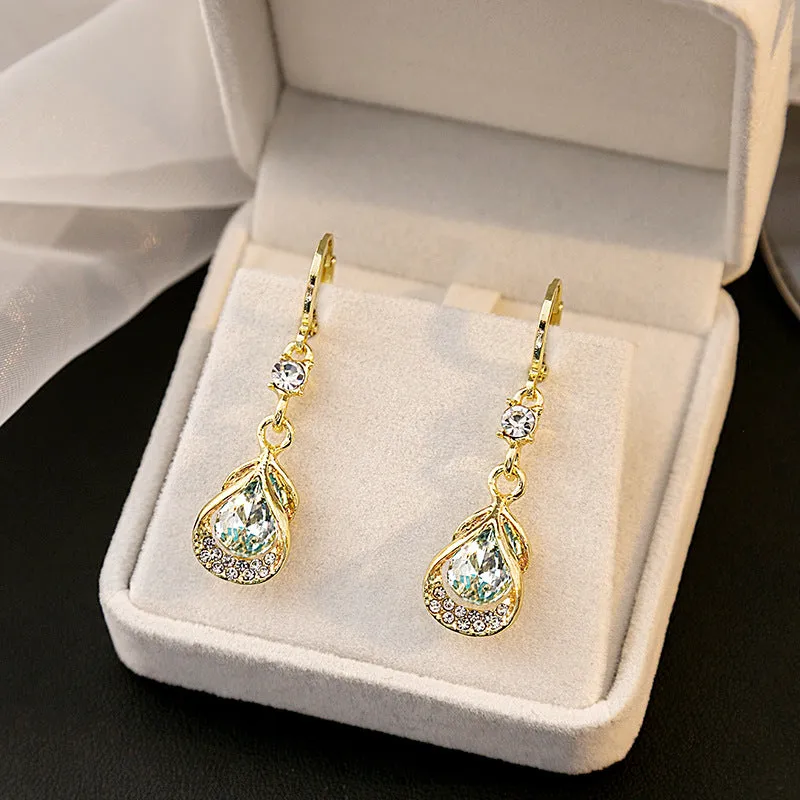 Wholesale Cat's Eye Stone Diamond Droplet Hollow Alloy Earrings