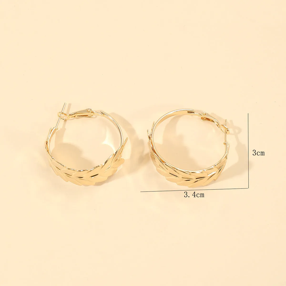 Wholesale Creative Exaggerated Metal Geometric Round Feather Hoop Earrings