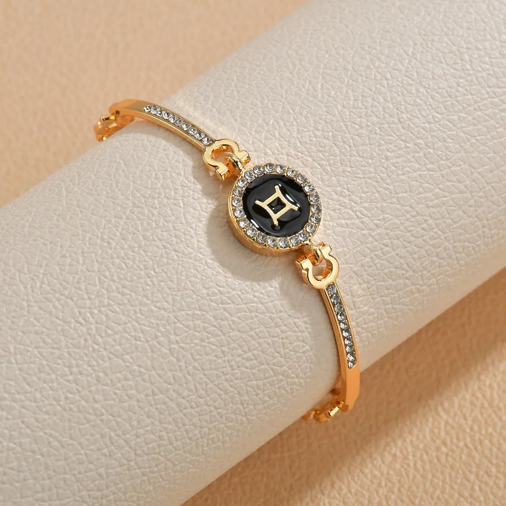 Wholesale Drip Oil 12 Constellation Gold Rhinestone Alloy Bracelet