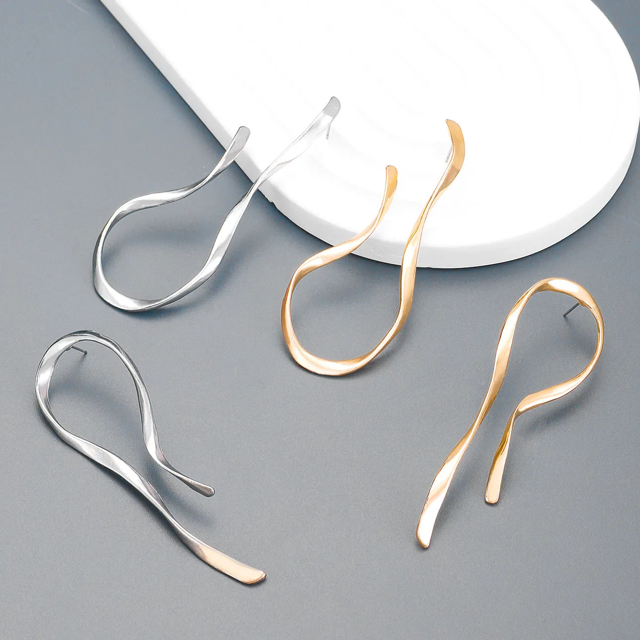 Wholesale Exaggerated Asymmetrical Linear Alloy Earrings