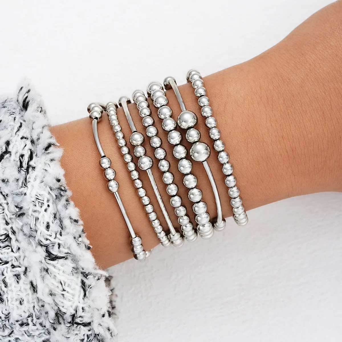 Wholesale Fashionable and simple elastic beaded bracelets 7 pieces