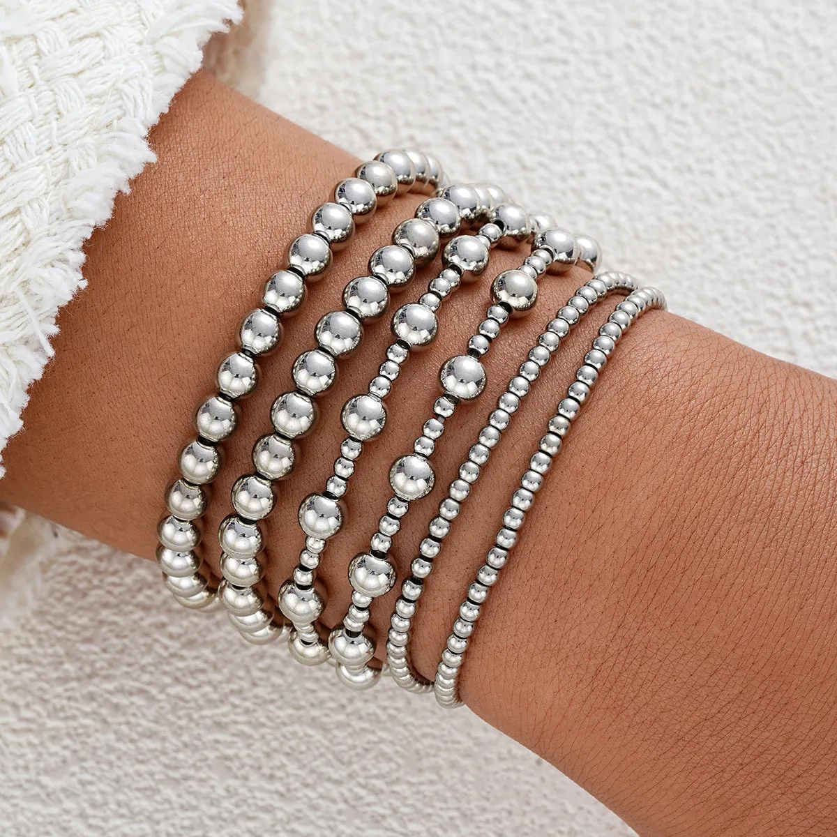 Wholesale Fashionable and simple elastic beaded bracelets 7 pieces