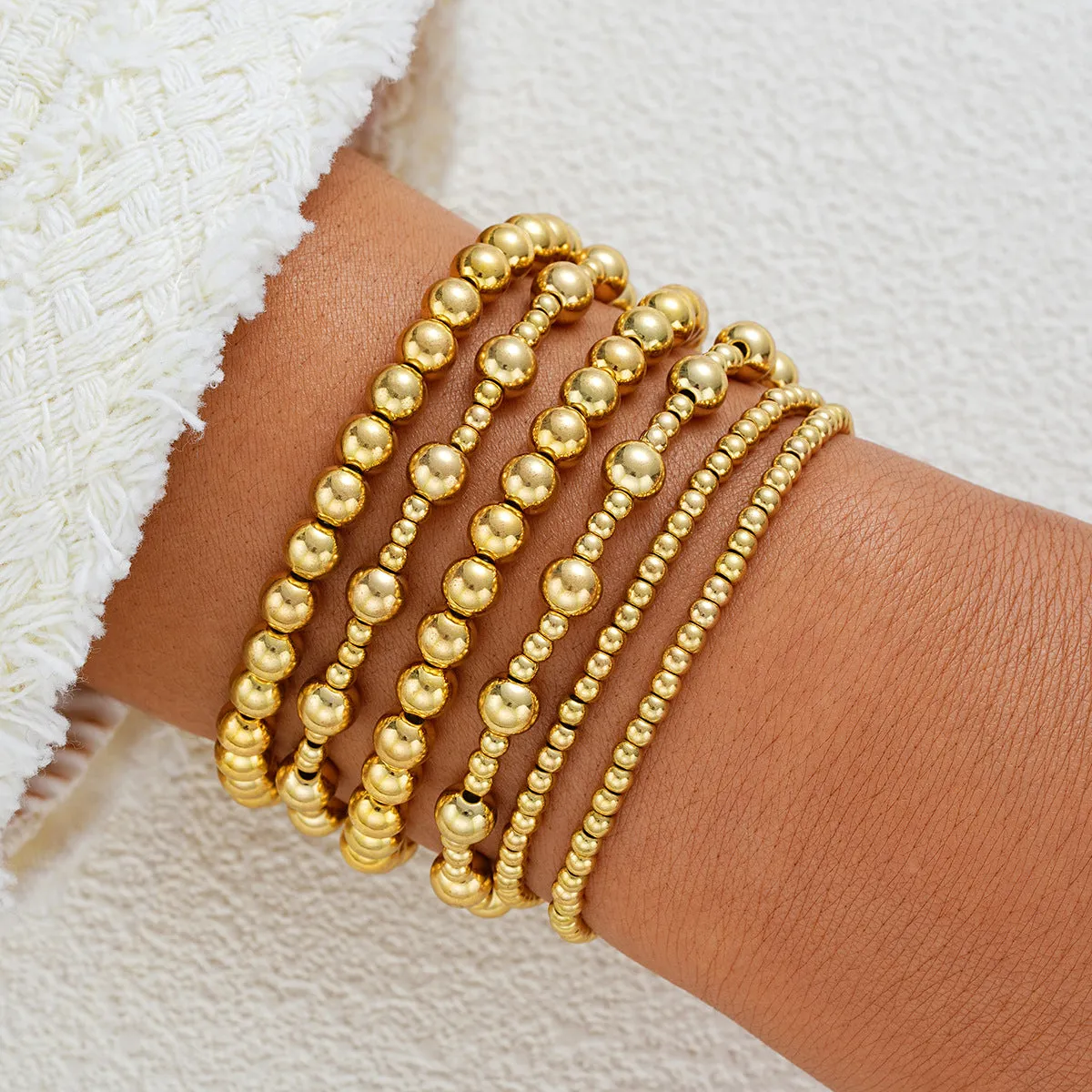 Wholesale Fashionable and simple elastic beaded bracelets 7 pieces
