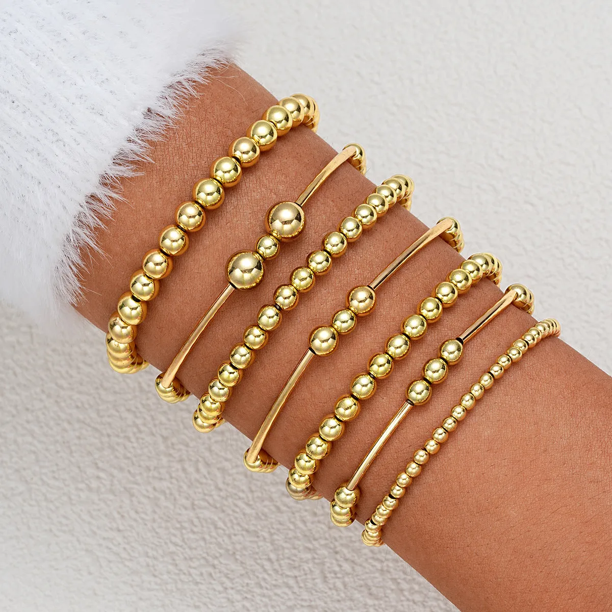 Wholesale Fashionable and simple elastic beaded bracelets 7 pieces