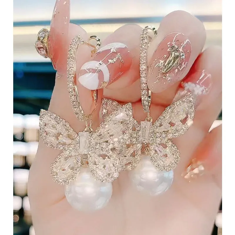Wholesale Heavy Zircon Bow Pearl Earrings