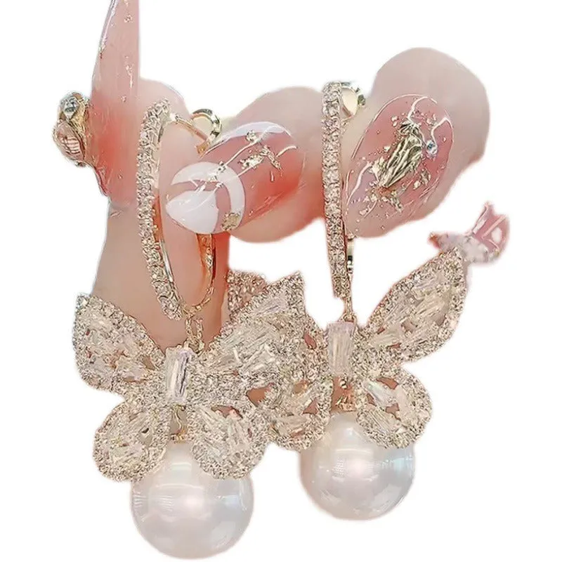 Wholesale Heavy Zircon Bow Pearl Earrings
