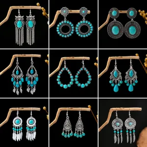 Wholesale Hollow Circular Flower Tassel Alloy Earrings