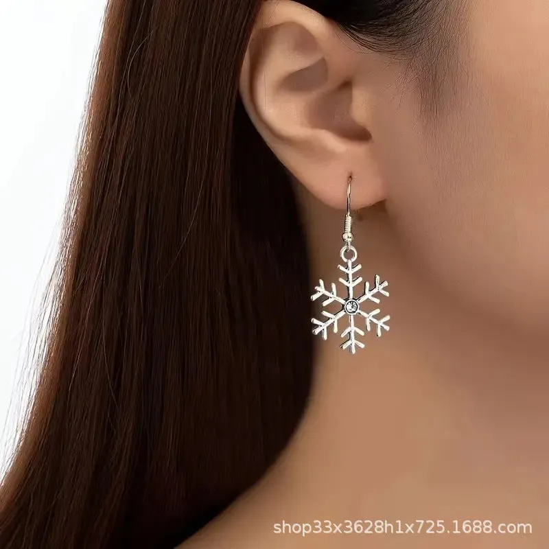 Wholesale Hollow Snowflake Alloy Drop Earrings Simple Flower Earrings
