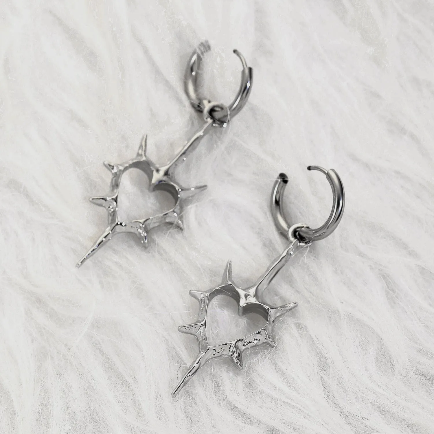 Wholesale Hollow thorn heart earrings