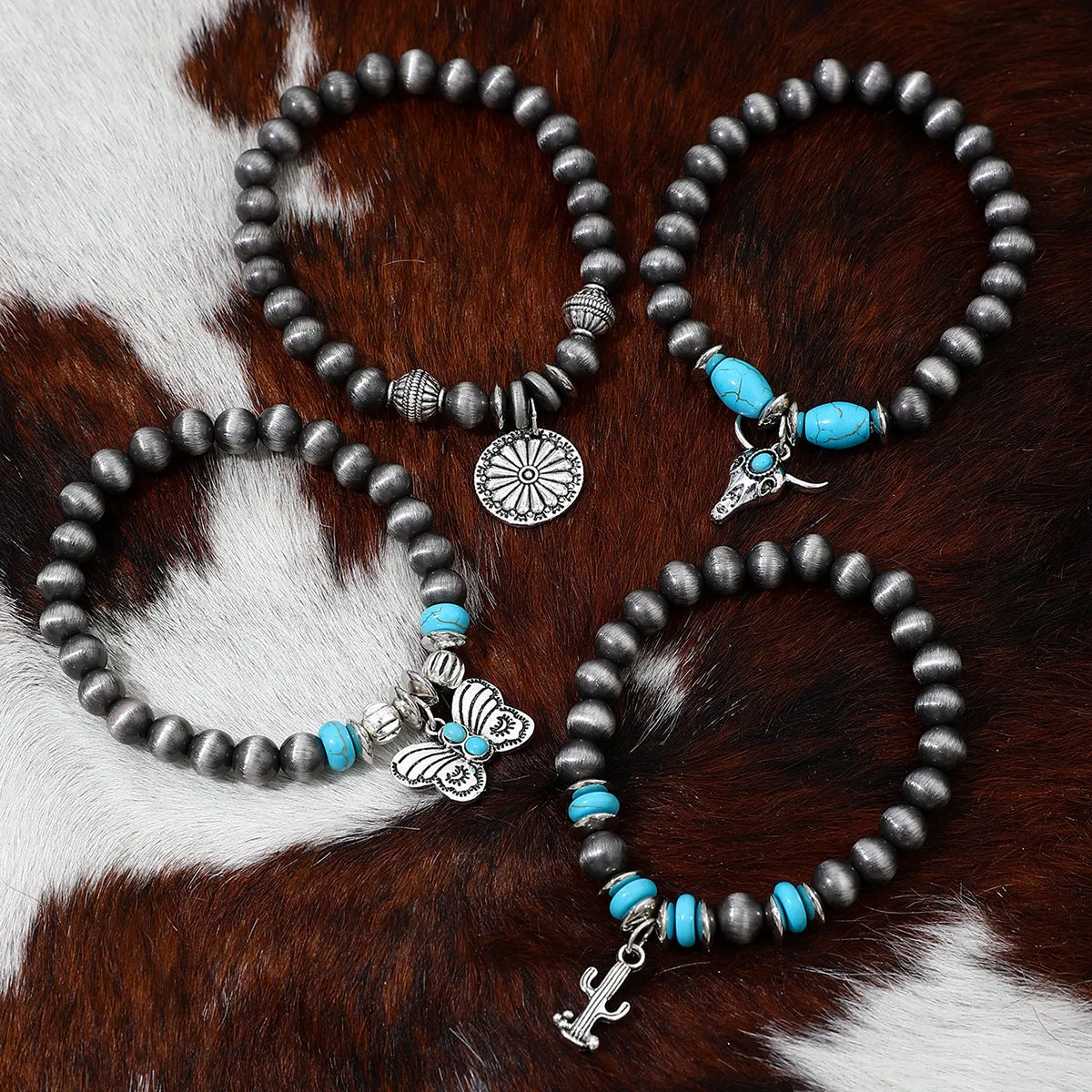 Wholesale Imitation pearl cactus butterfly bull head flower elastic bracelet