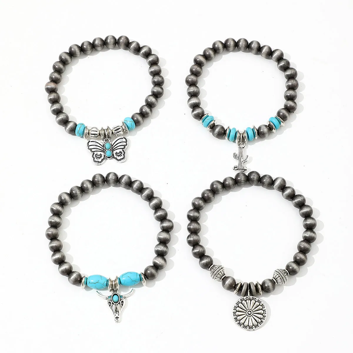 Wholesale Imitation pearl cactus butterfly bull head flower elastic bracelet
