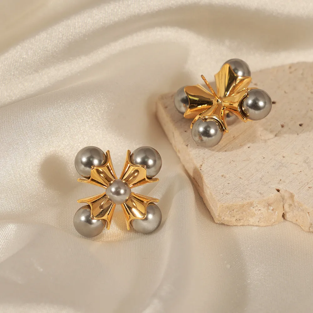 Wholesale Imitation Pearl Windmill Copper Earrings