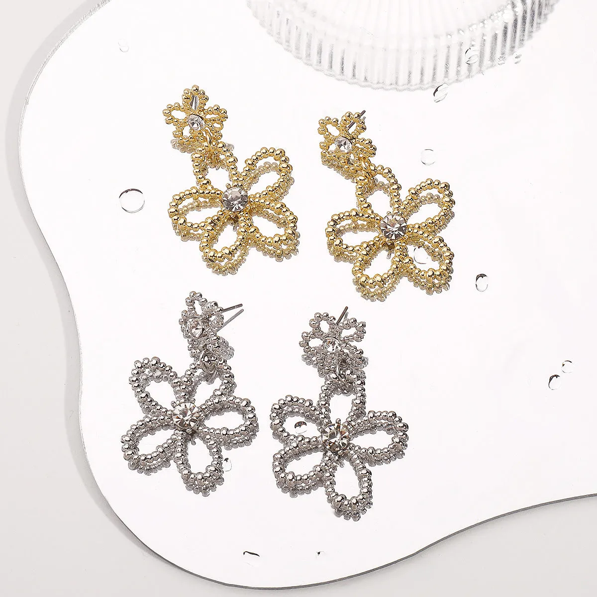 Wholesale metal-style geometric diamond earrings fresh and sweet hollow flowers earrings