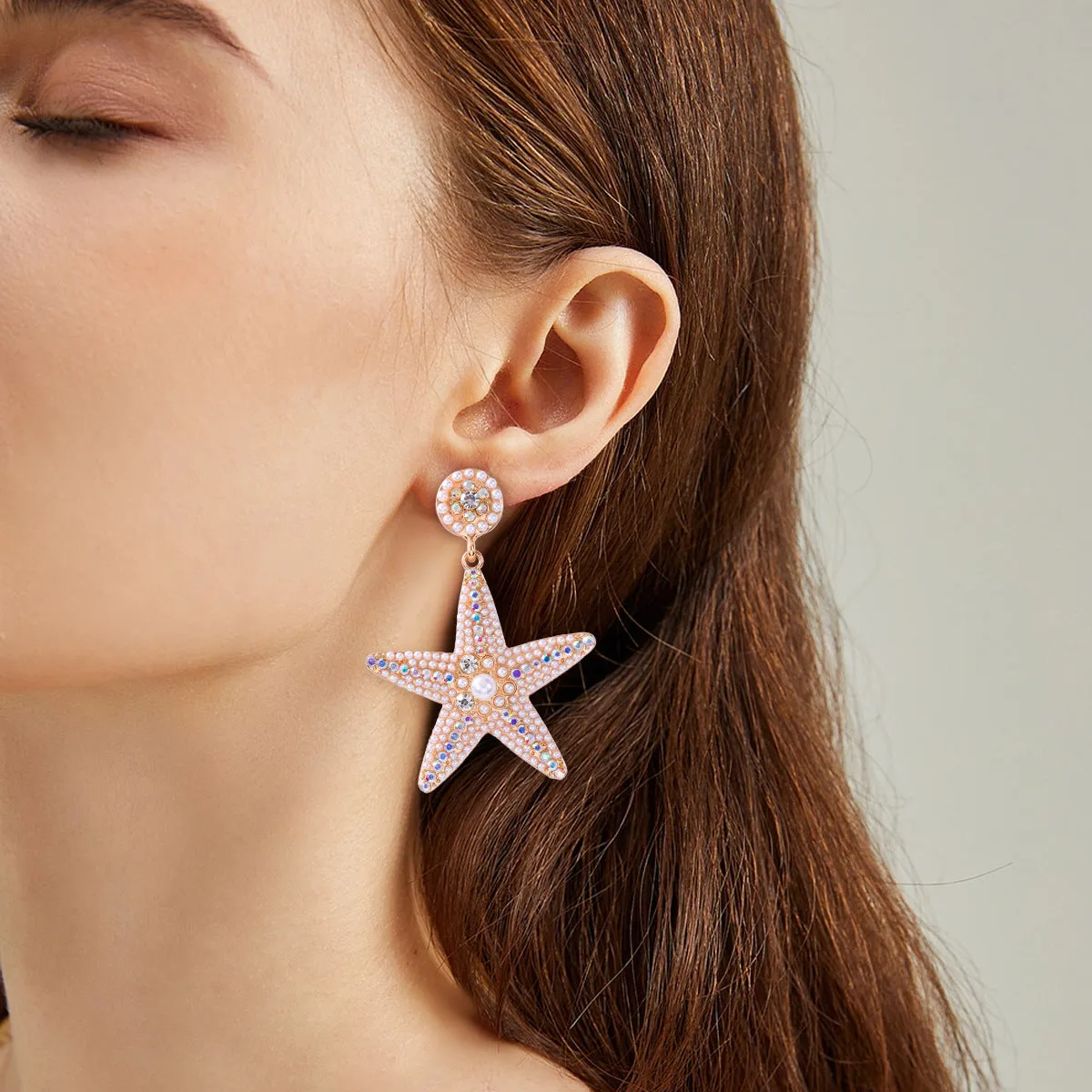 Wholesale of Butterfly Five Pointed Star Pearl Alloy Earrings