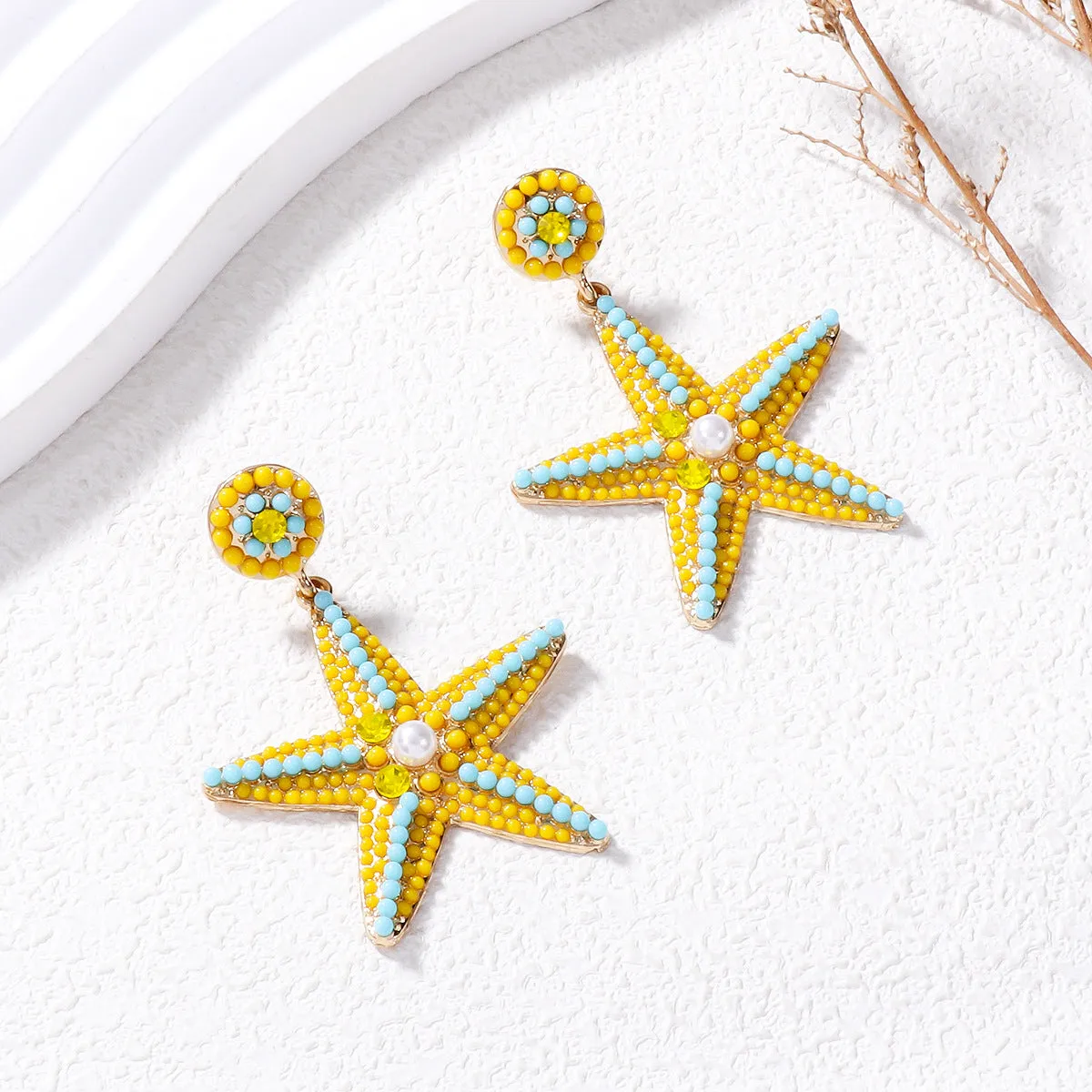 Wholesale of Butterfly Five Pointed Star Pearl Alloy Earrings