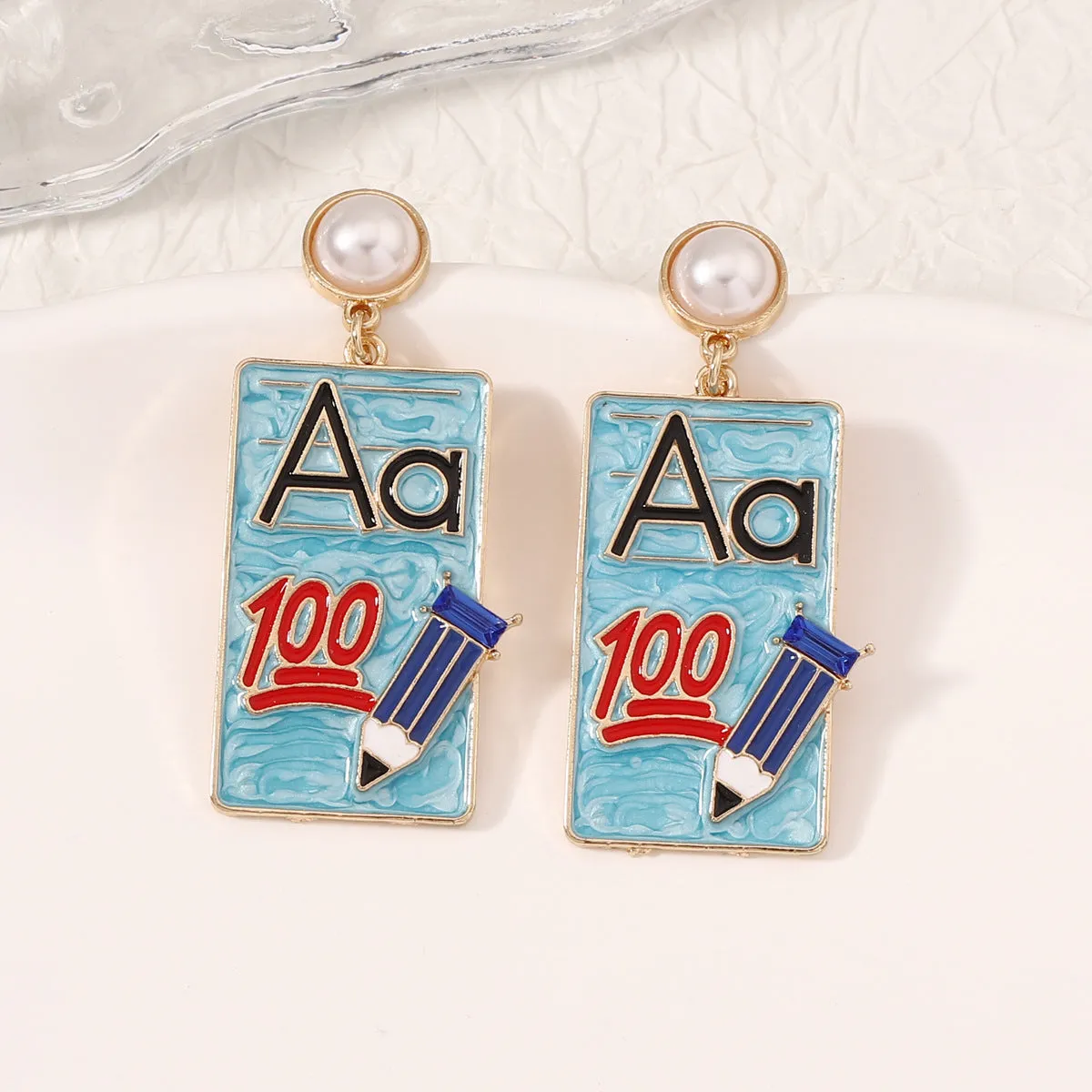 Wholesale of Diamond Alloy Earrings for Starting School Season Books