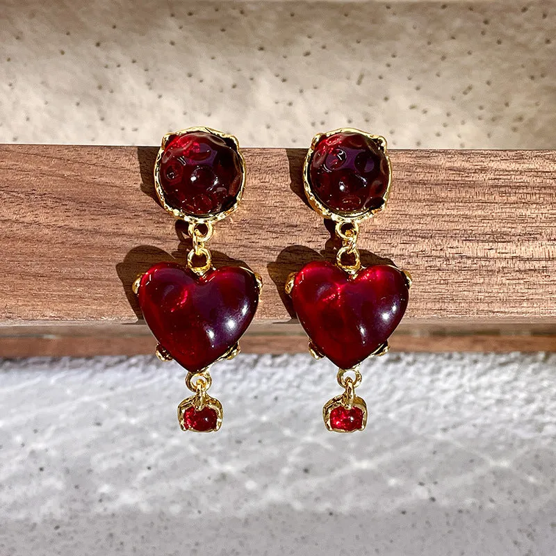 Wholesale of Glazed Red Heart Alloy Earrings