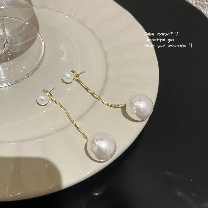 Wholesale of Long Tassel Pearl Alloy Earrings