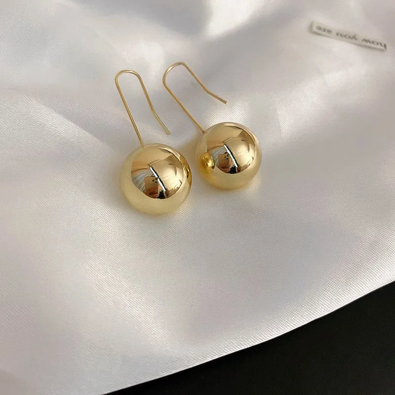 Wholesale of Medieval Round Flower Tassel Metal Earrings
