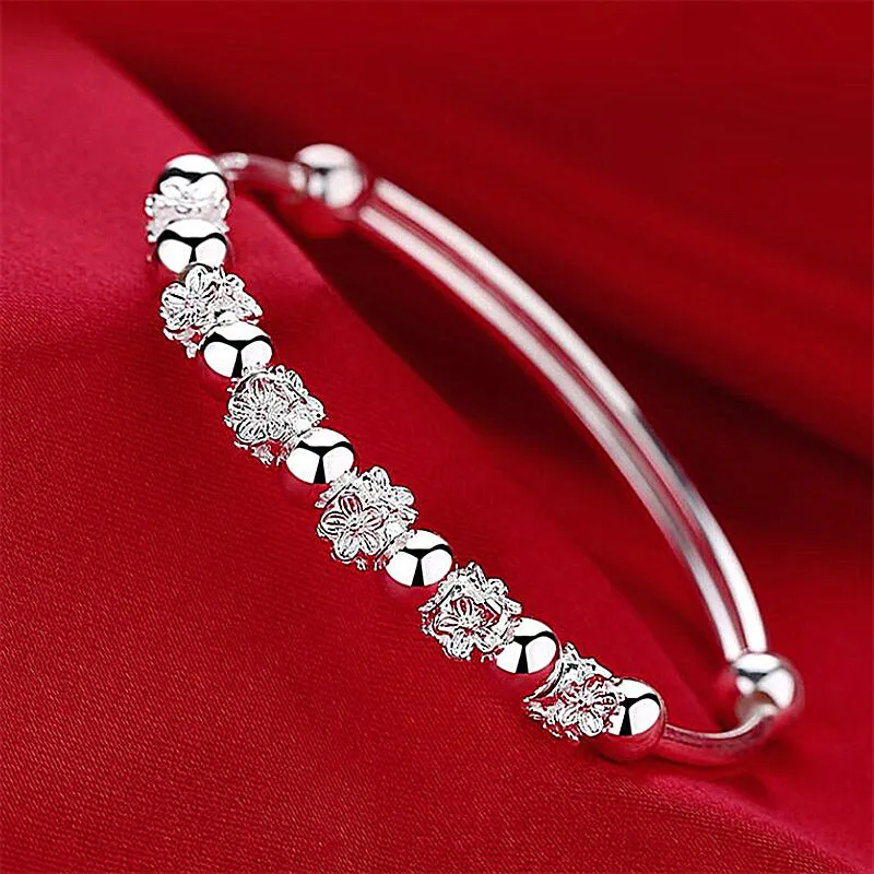 Wholesale Plum blossom rotating bead bracelet