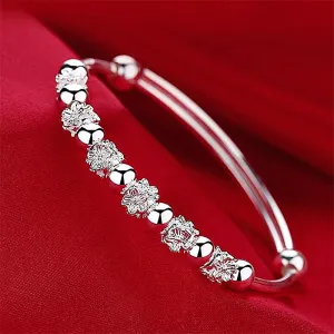 Wholesale Plum blossom rotating bead bracelet