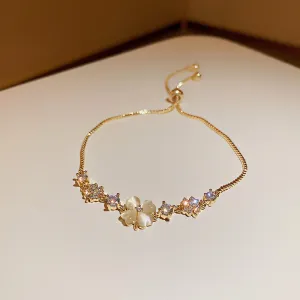 Wholesale Real gold electroplated diamond cat's eye stone high-end temperament petal flower hand jewelry