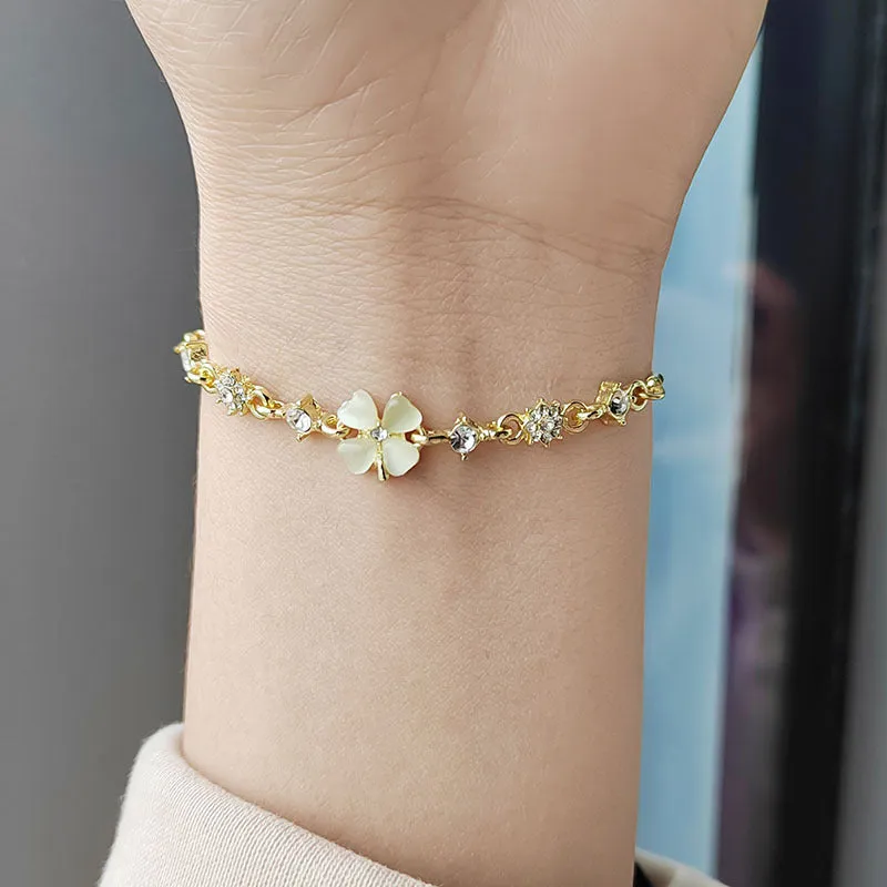 Wholesale Real gold electroplated diamond cat's eye stone high-end temperament petal flower hand jewelry