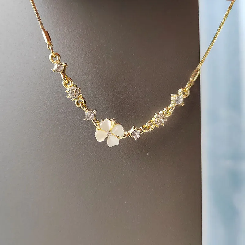 Wholesale Real gold electroplated diamond cat's eye stone high-end temperament petal flower hand jewelry