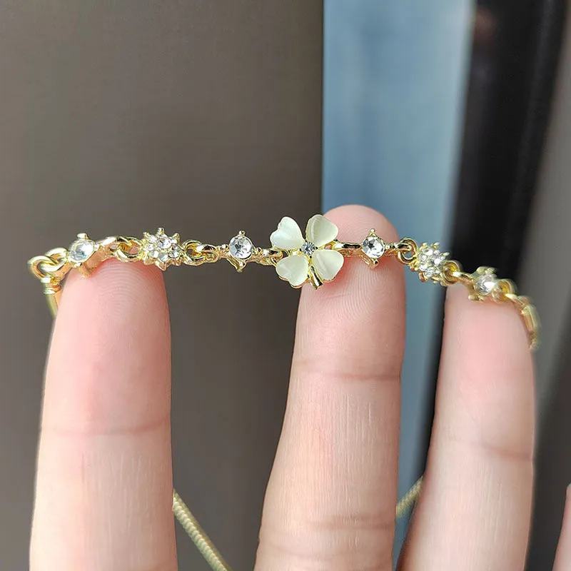 Wholesale Real gold electroplated diamond cat's eye stone high-end temperament petal flower hand jewelry