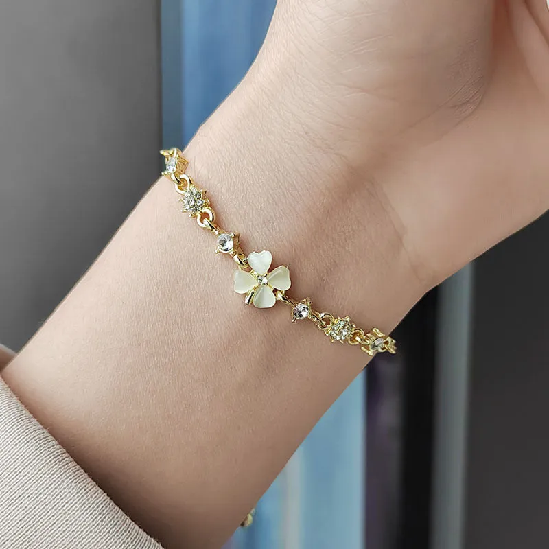 Wholesale Real gold electroplated diamond cat's eye stone high-end temperament petal flower hand jewelry