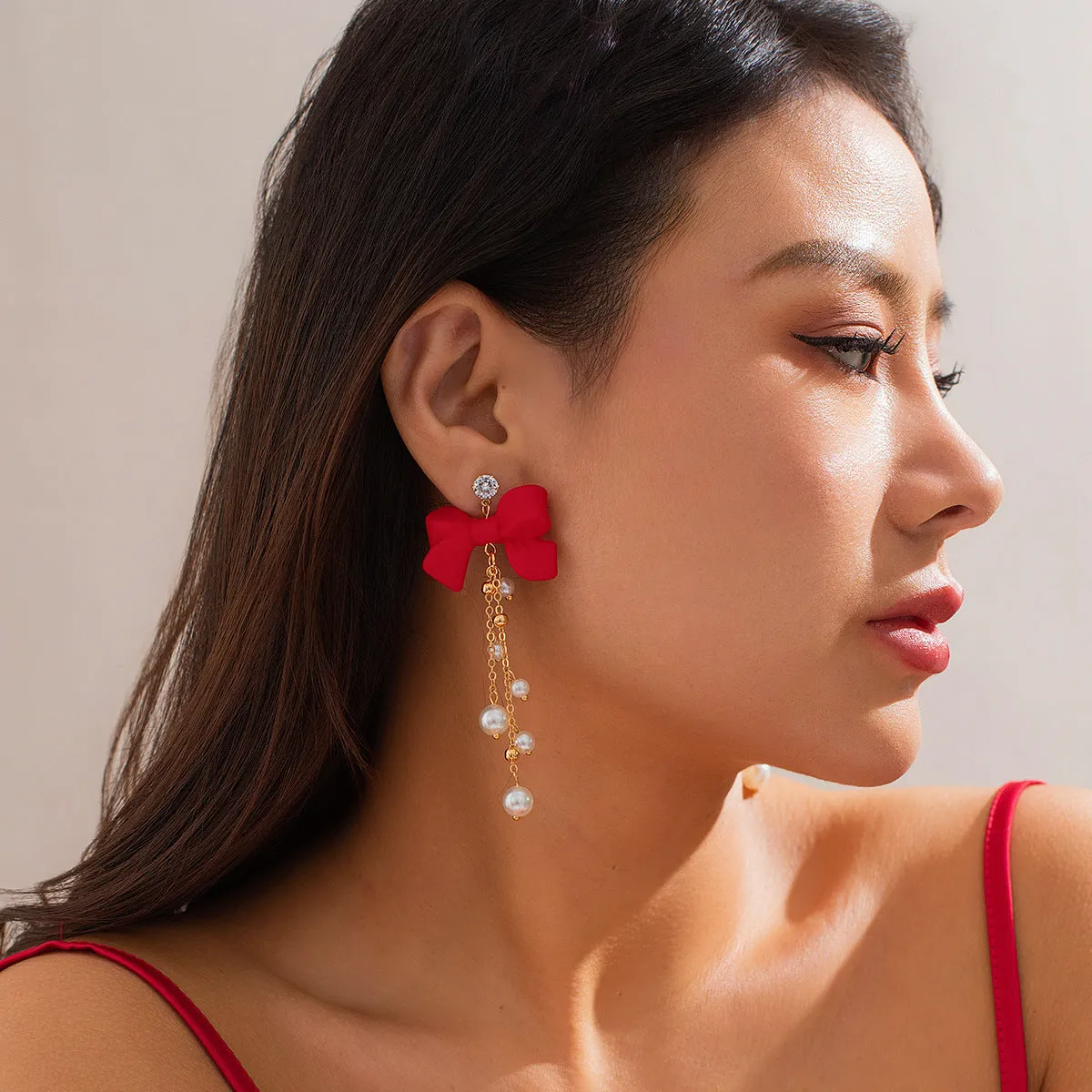 Wholesale red bow earrings imitate the pearl tassel earrings