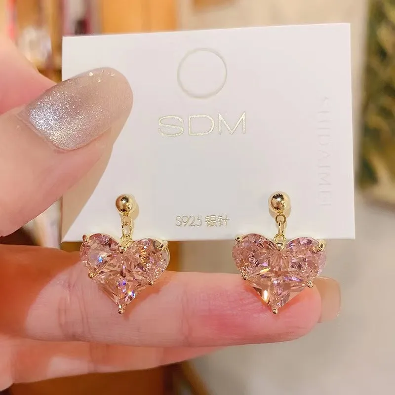 Wholesale Romantic heart-shaped peach pink earrings, fresh and sweet, simple and cool, super shiny earrings