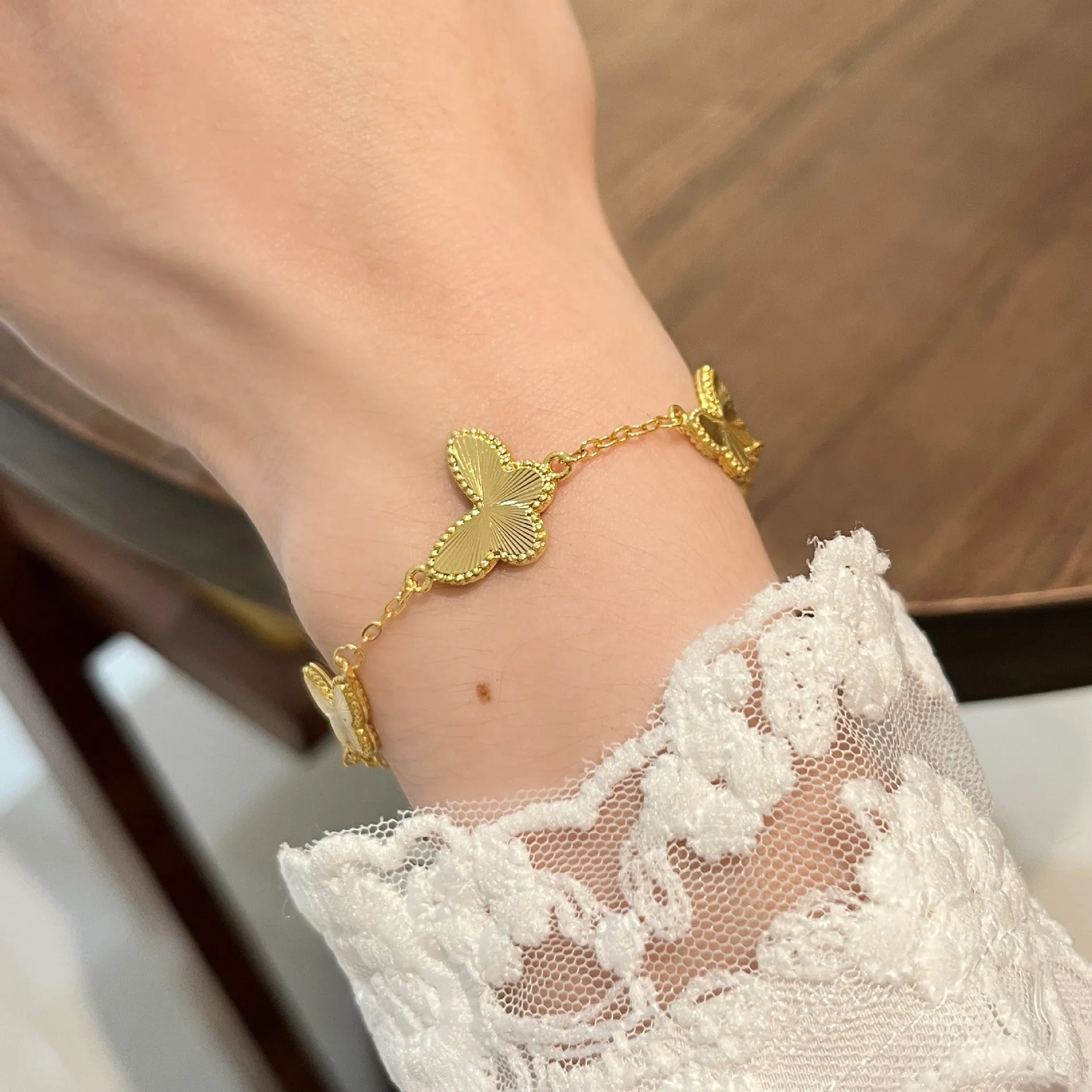 Wholesale Sense Golden Double-sided Butterfly Bracelet
