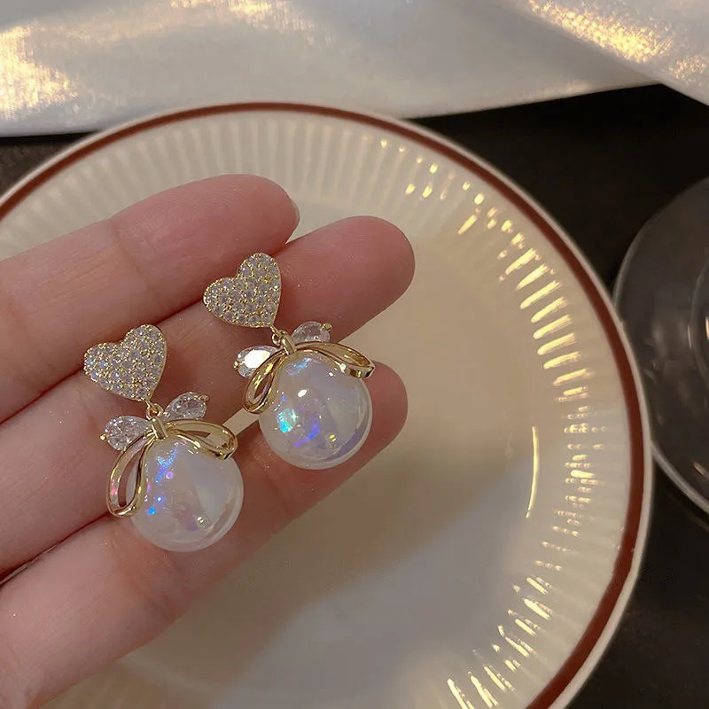 Wholesale Silver Needle Zircon Heart Bow Mermaid Concubine Pearl Copper Earrings