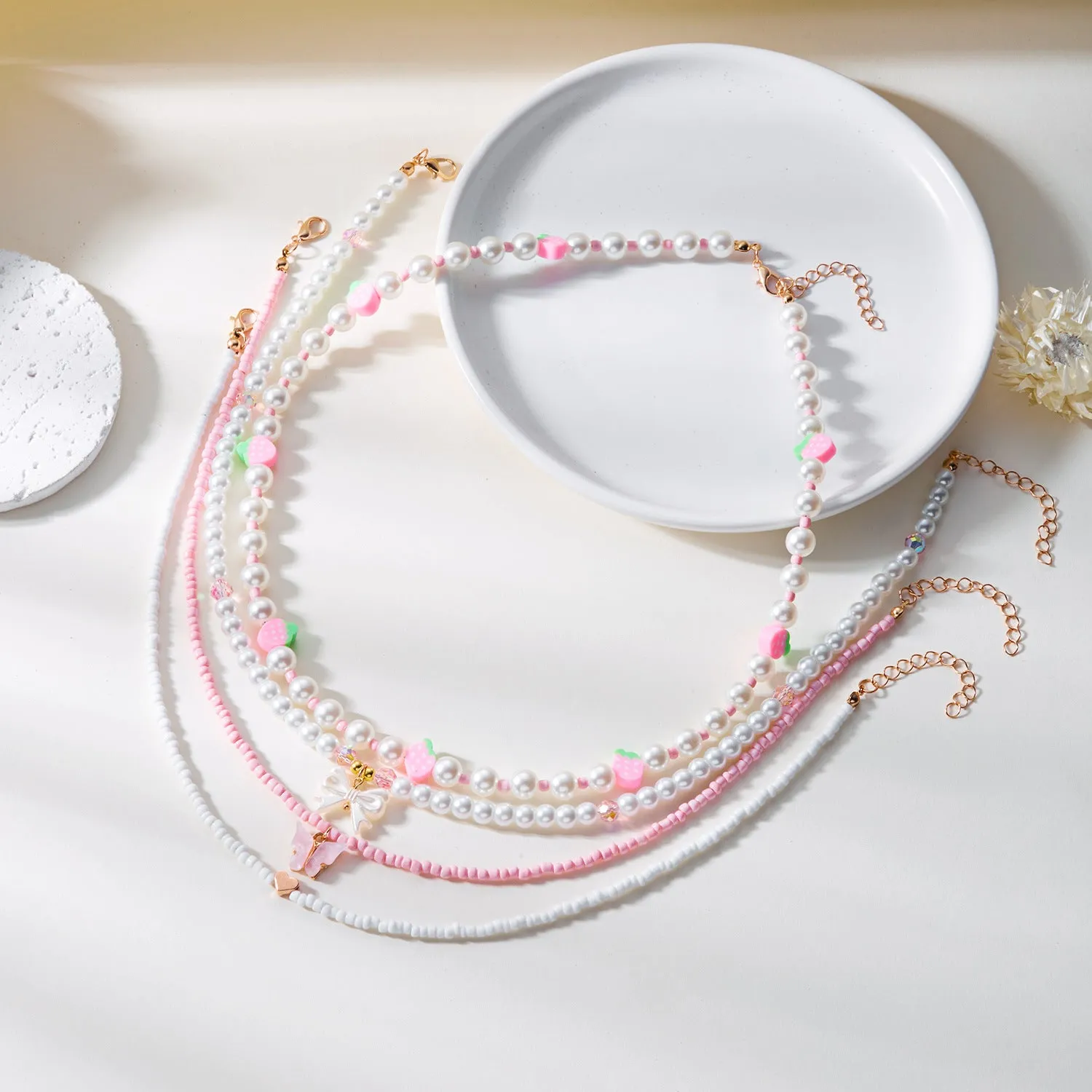 Wholesale Strawberry necklace simple summer small fresh soft ceramic rice pearl necklace female